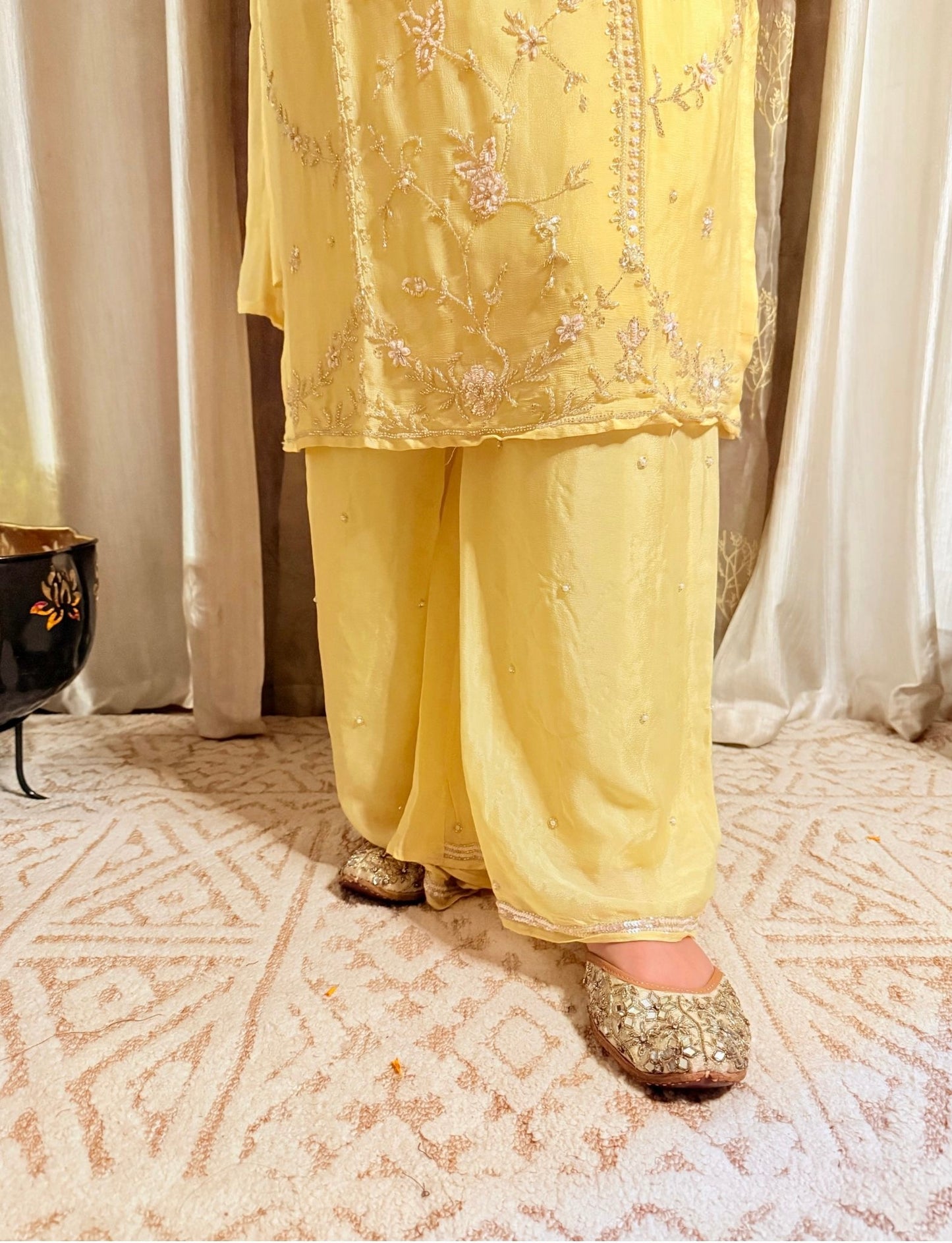 Yellow embroidered outfit with matching pants and gold shoes on a patterned floor. Lemonlight_Embroidered_Chinon_Suit