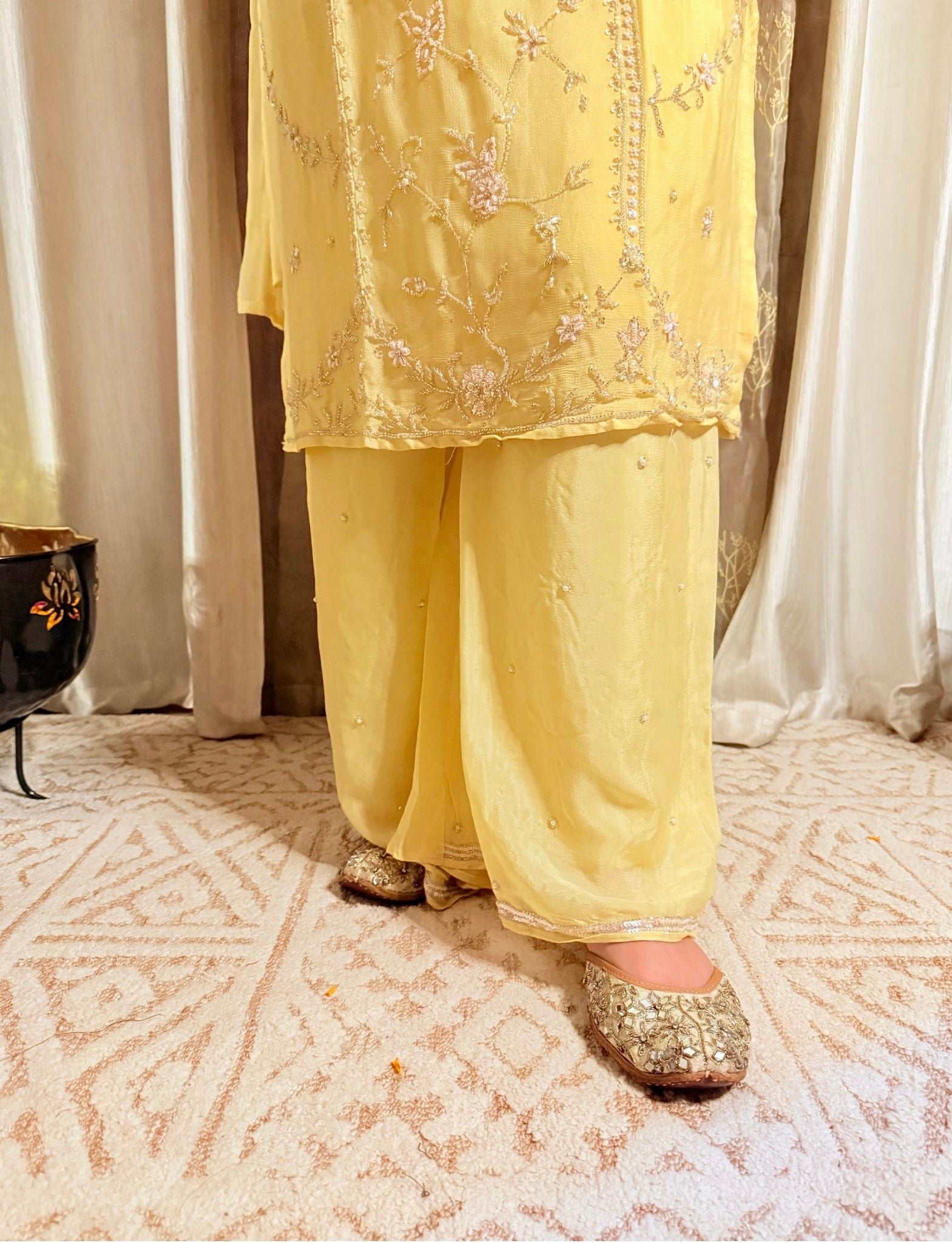 Yellow embroidered outfit with matching pants and gold shoes on a patterned floor. Lemonlight_Embroidered_Chinon_Suit